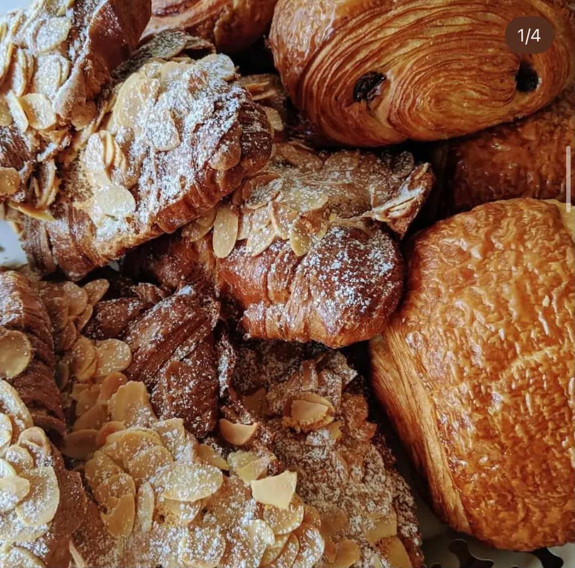 Freshly baked croissants and almond pastries
